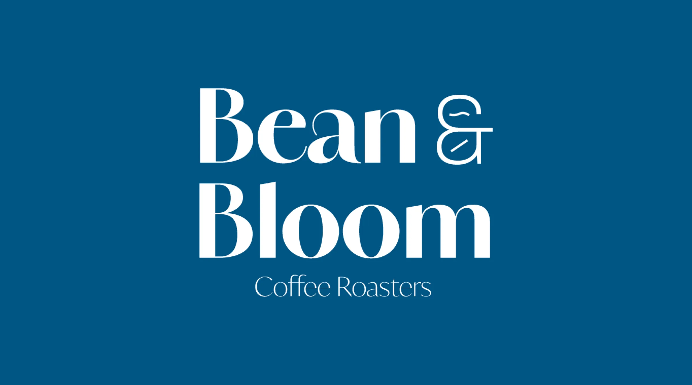 Bean & Bloom Coffee Roasters logo in white on deep blue