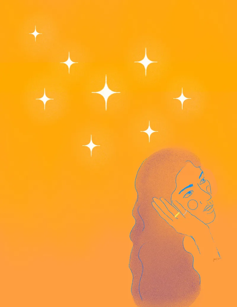 Woman under sparkling stars on orange